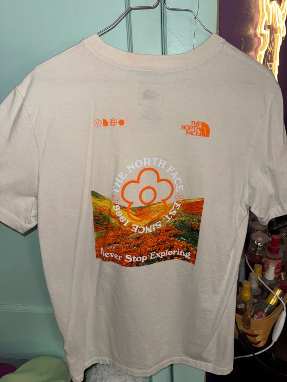 The North Face Cream Tee with Orange and Multicolor Landscape Print